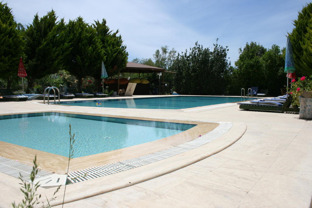 Aparthotel Paradise Garden Gumusluk Evleri Exterior foto