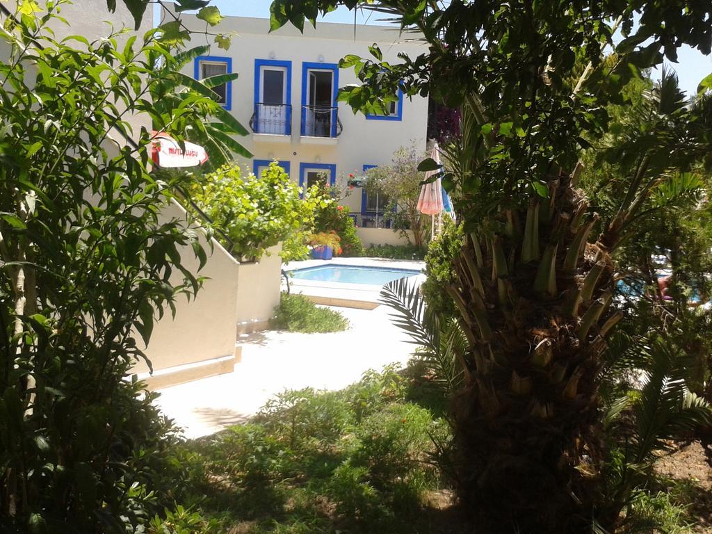 Aparthotel Paradise Garden Gumusluk Evleri Exterior foto