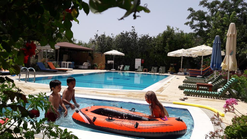 Aparthotel Paradise Garden Gumusluk Evleri Exterior foto