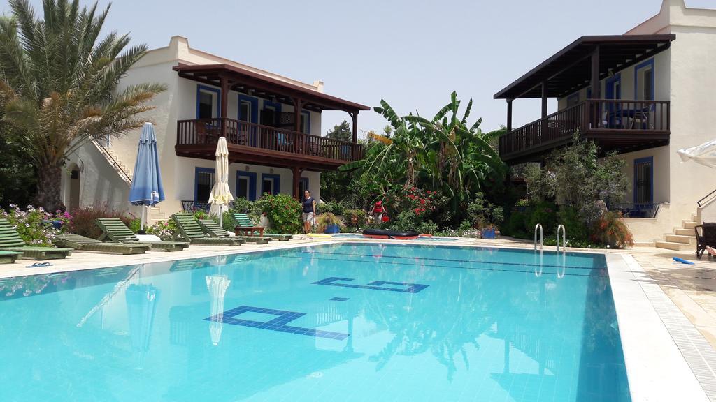 Aparthotel Paradise Garden Gumusluk Evleri Exterior foto