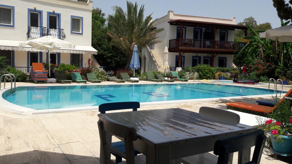 Aparthotel Paradise Garden Gumusluk Evleri Exterior foto