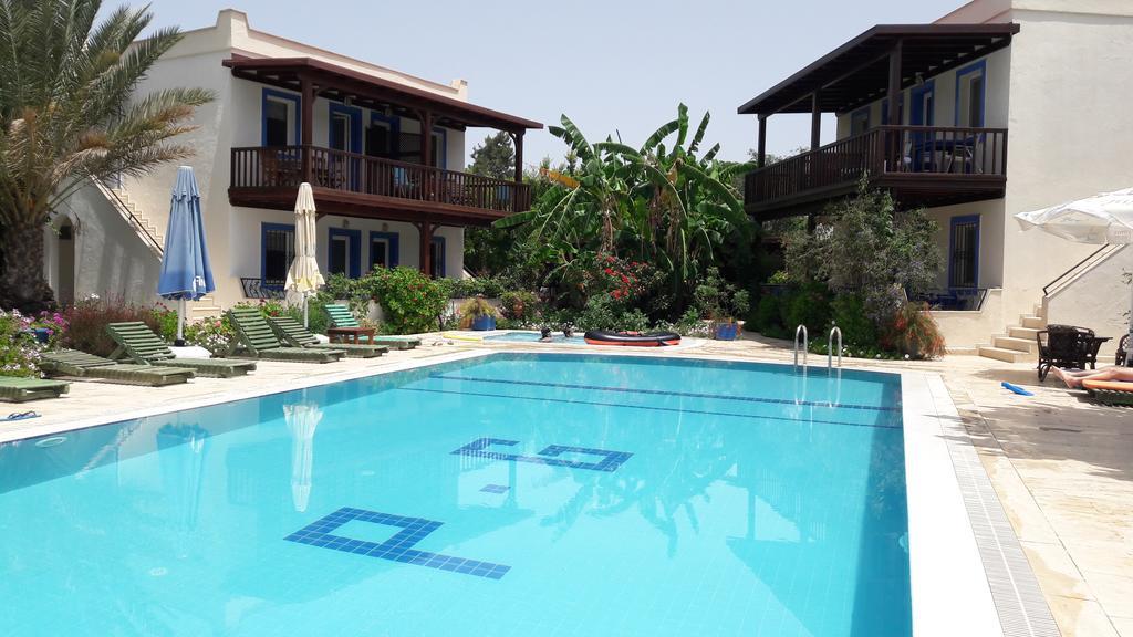 Aparthotel Paradise Garden Gumusluk Evleri Exterior foto