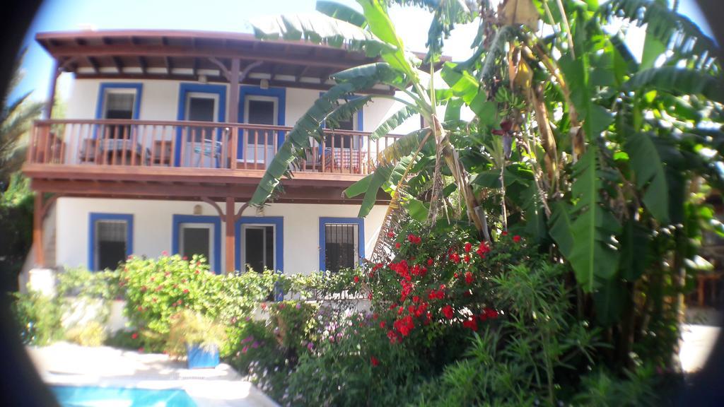 Aparthotel Paradise Garden Gumusluk Evleri Exterior foto